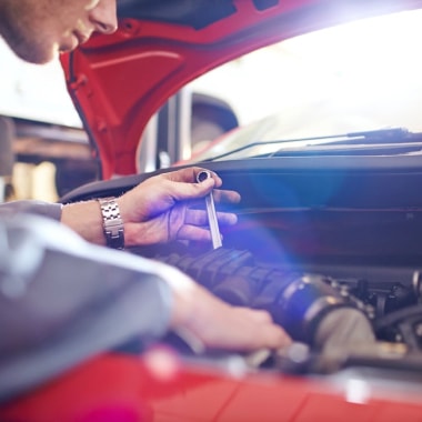 mechanic fixing a car